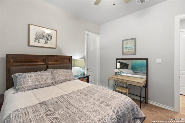 carpeted bedroom featuring ceiling fan