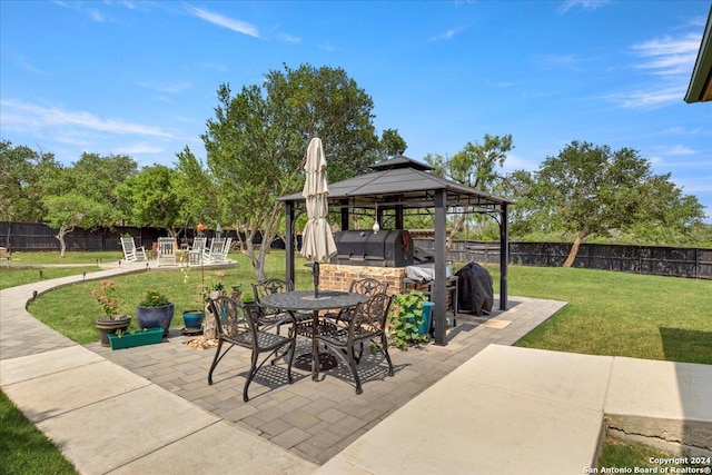 view of patio / terrace featuring a gazebo and a grill