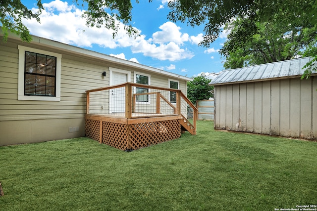 view of yard featuring a wooden deck