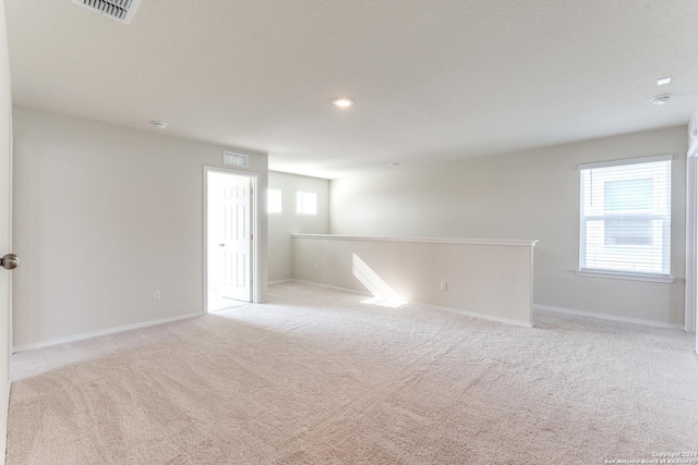 empty room with light carpet