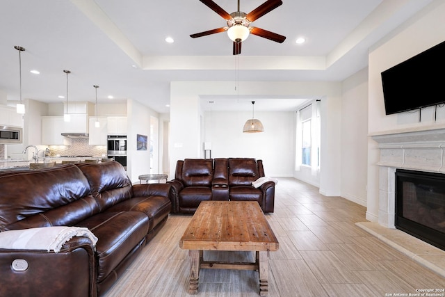 living room with ceiling fan