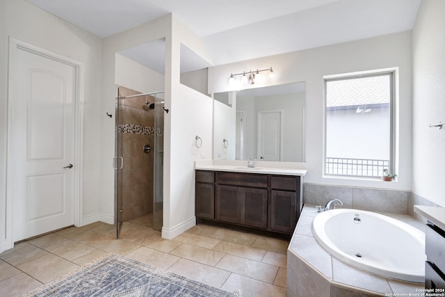 bathroom with shower with separate bathtub, tile patterned floors, and a healthy amount of sunlight