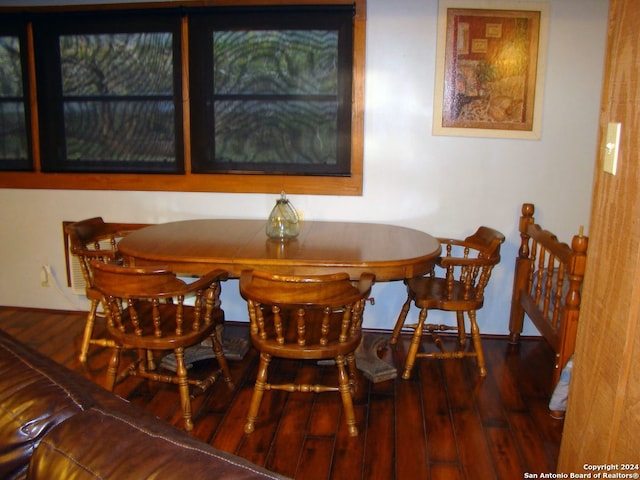 dining area featuring hardwood / wood-style floors