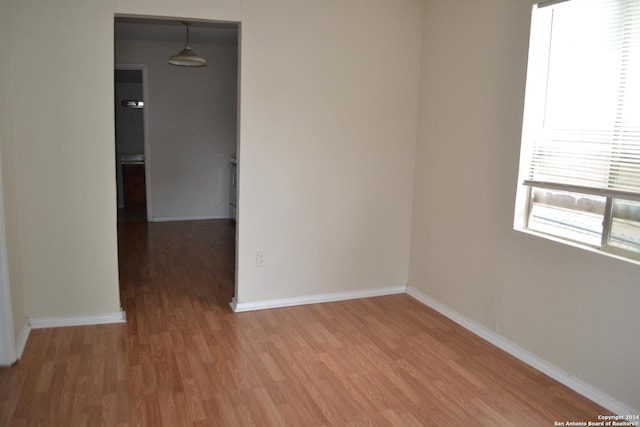 empty room featuring hardwood / wood-style floors