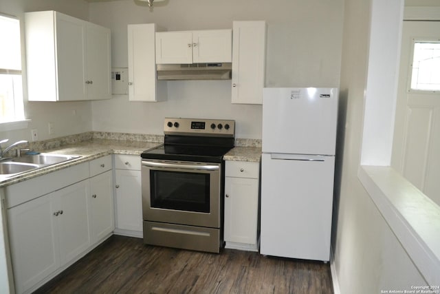 kitchen featuring stainless steel electric range, white cabinets, sink, dark hardwood / wood-style floors, and white fridge