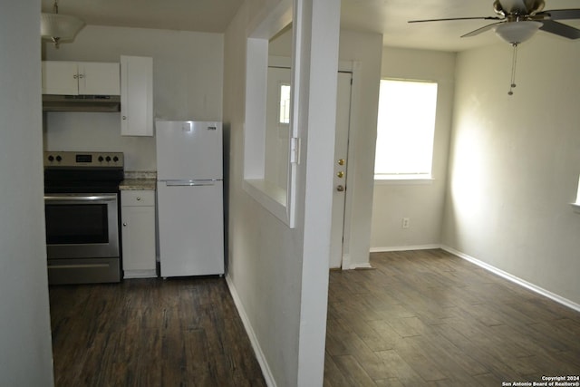 kitchen featuring ceiling fan, electric range, white cabinets, white fridge, and dark hardwood / wood-style floors