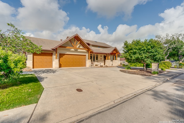 craftsman inspired home with a garage