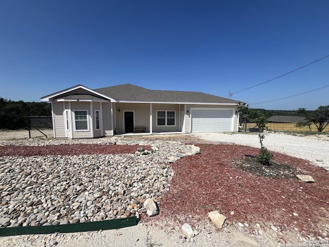 single story home with a garage