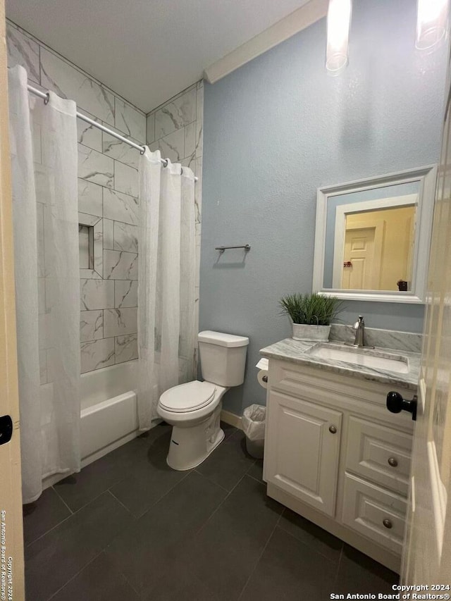 full bathroom with toilet, shower / tub combo with curtain, vanity, and tile patterned flooring