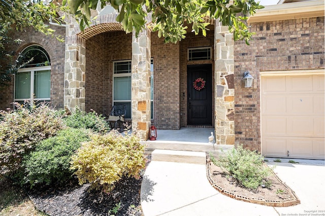 property entrance featuring a garage