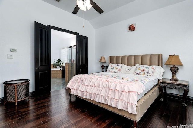 bedroom with vaulted ceiling, dark wood-type flooring, and ceiling fan