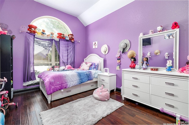 bedroom featuring lofted ceiling and dark wood-type flooring