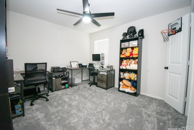 carpeted office with ceiling fan