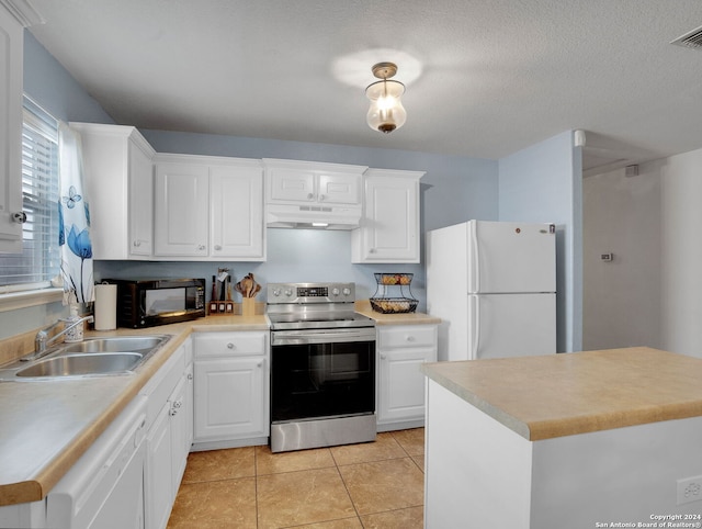 kitchen with a textured ceiling, white cabinetry, sink, and white appliances