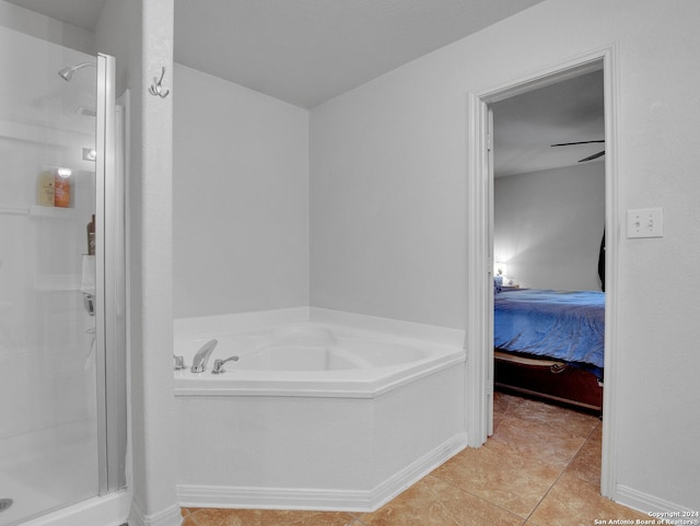 bathroom featuring plus walk in shower, tile patterned floors, and ceiling fan