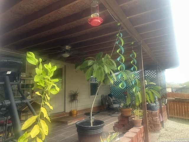 view of patio featuring ceiling fan