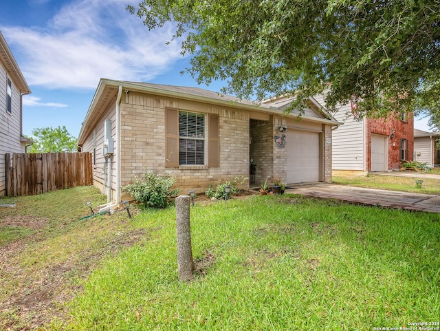 view of front facade with a front lawn and a garage