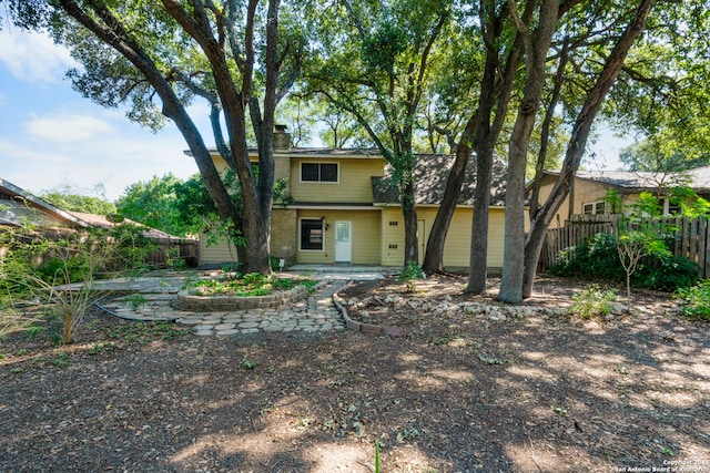 back of property with a patio area