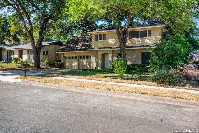 view of front of property with a garage