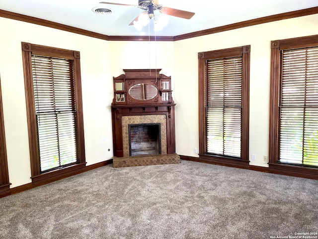 unfurnished living room featuring ornamental molding, carpet flooring, and ceiling fan