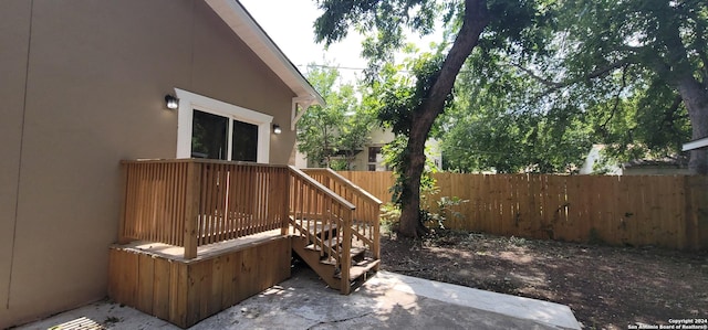 exterior space featuring a wooden deck