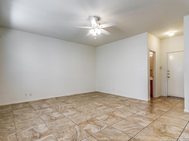 spare room featuring ceiling fan