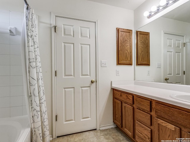 bathroom with vanity and shower / bath combo with shower curtain