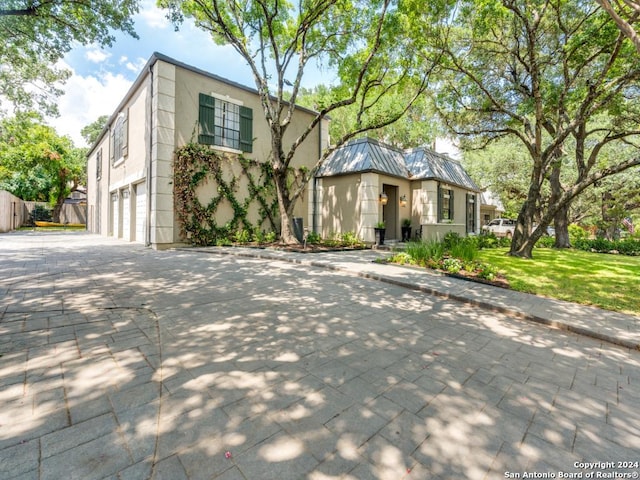 view of front of home with a garage