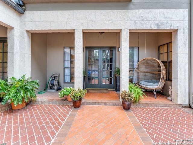 entrance to property featuring french doors