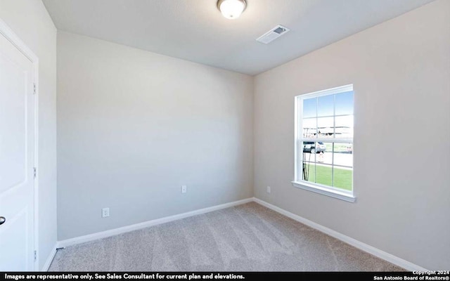 view of carpeted spare room