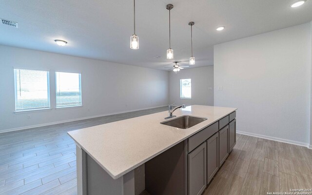 unfurnished room featuring ceiling fan and dark wood-type flooring