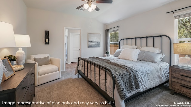 carpeted bedroom featuring ceiling fan and vaulted ceiling