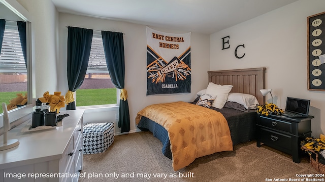 bedroom featuring light colored carpet