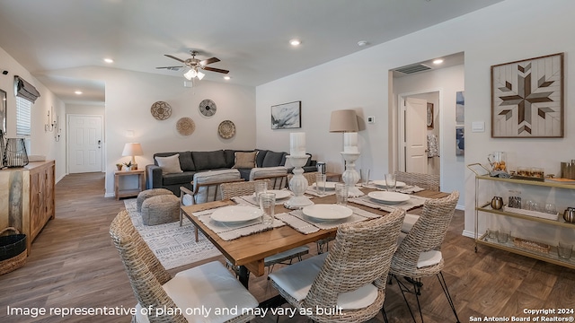 dining area featuring ceiling fan and dark hardwood / wood-style flooring