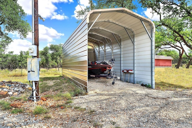 view of parking with a carport