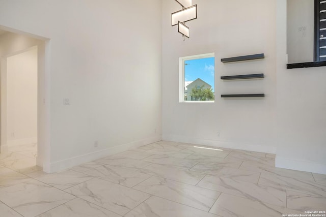 empty room featuring tile floors