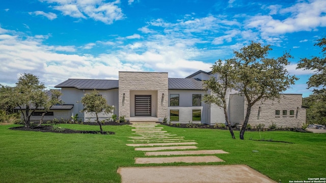 modern home with a front yard