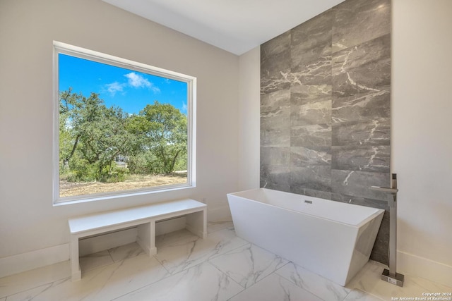 bathroom featuring tile walls and tile floors