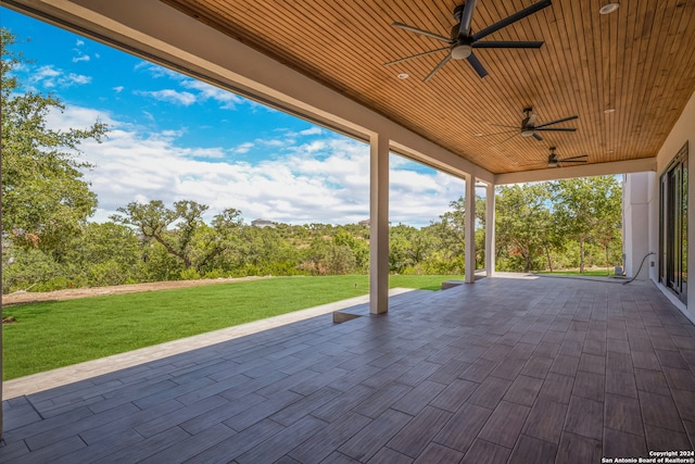 view of patio featuring ceiling fan