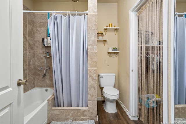 bathroom featuring wood-type flooring, shower / bath combination with curtain, and toilet