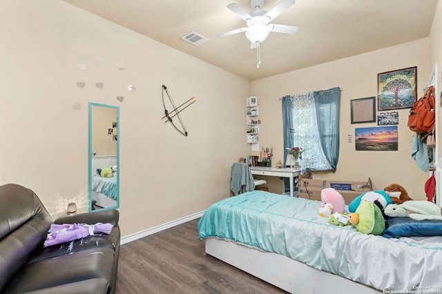 bedroom featuring dark wood-type flooring and ceiling fan