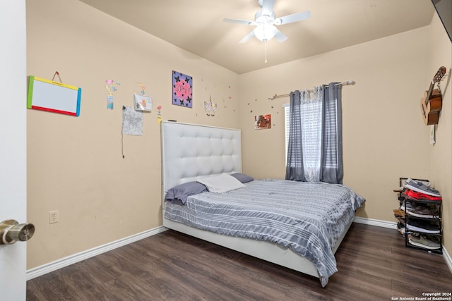 bedroom featuring ceiling fan and dark hardwood / wood-style floors