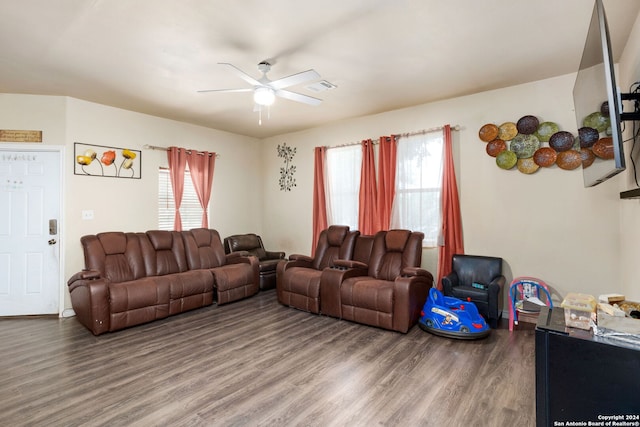 living room with ceiling fan and hardwood / wood-style floors