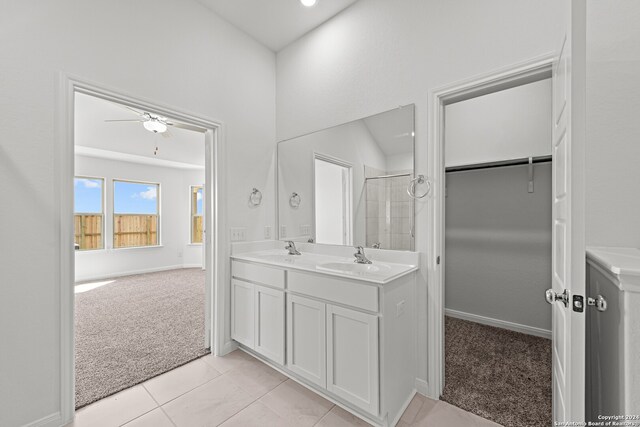 bathroom featuring vanity, tile patterned floors, and ceiling fan