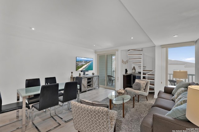 living room with light hardwood / wood-style floors