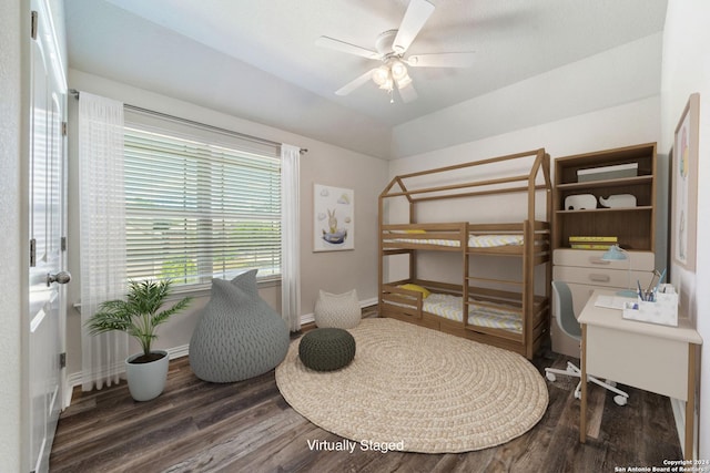 bedroom featuring ceiling fan and dark wood-type flooring