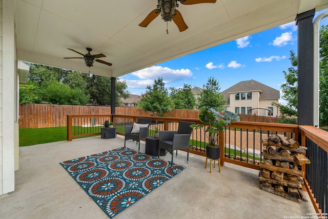 view of patio / terrace featuring ceiling fan