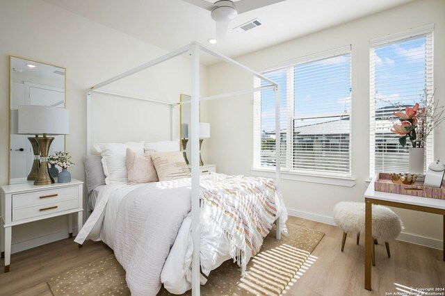 bedroom featuring ceiling fan and wood-type flooring