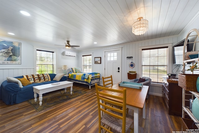 dining room featuring ornamental molding, wood ceiling, a wall unit AC, and wood finished floors