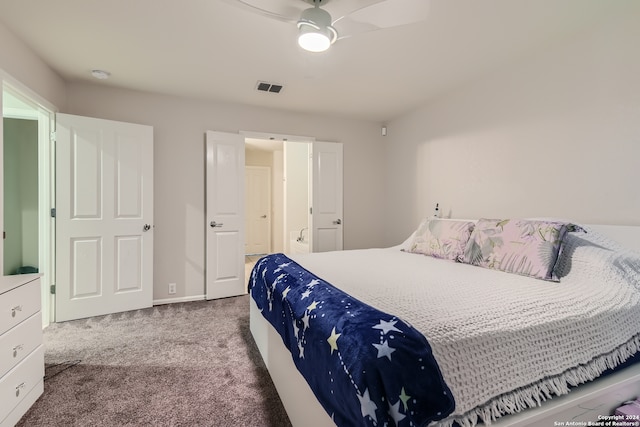 carpeted bedroom featuring ceiling fan